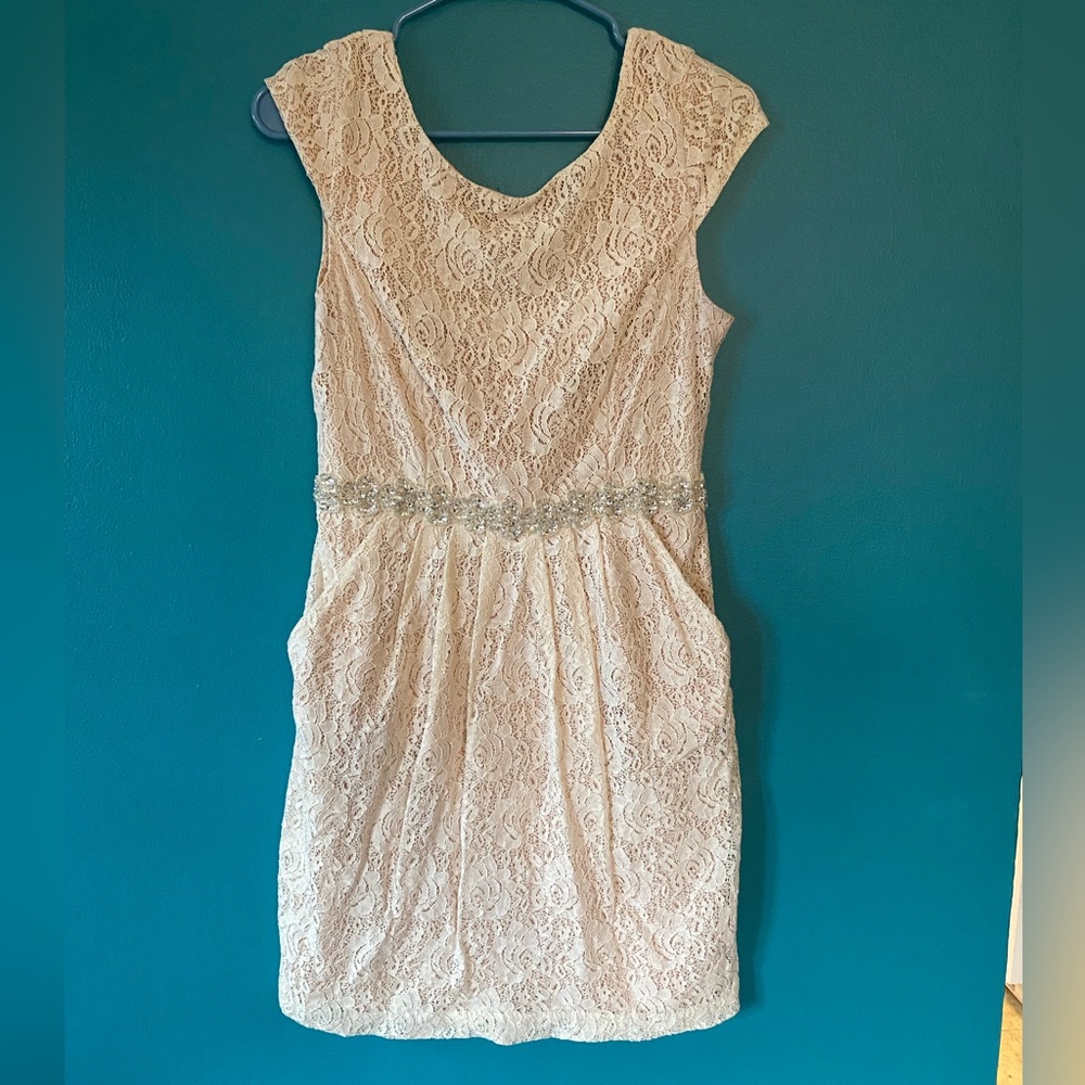Blush lace dress with beaded belt and pockets